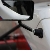 close shot of the driver's side mirror on the F1000 race car