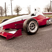 Closeup shot of a 3-piece Jongbloed JRW 330 wheel on the F1000 race car from Philly Motor Sports for Formula B racing