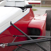 Upper A-arms and view of the aluminum radiator on the left side of the F1000 race car
